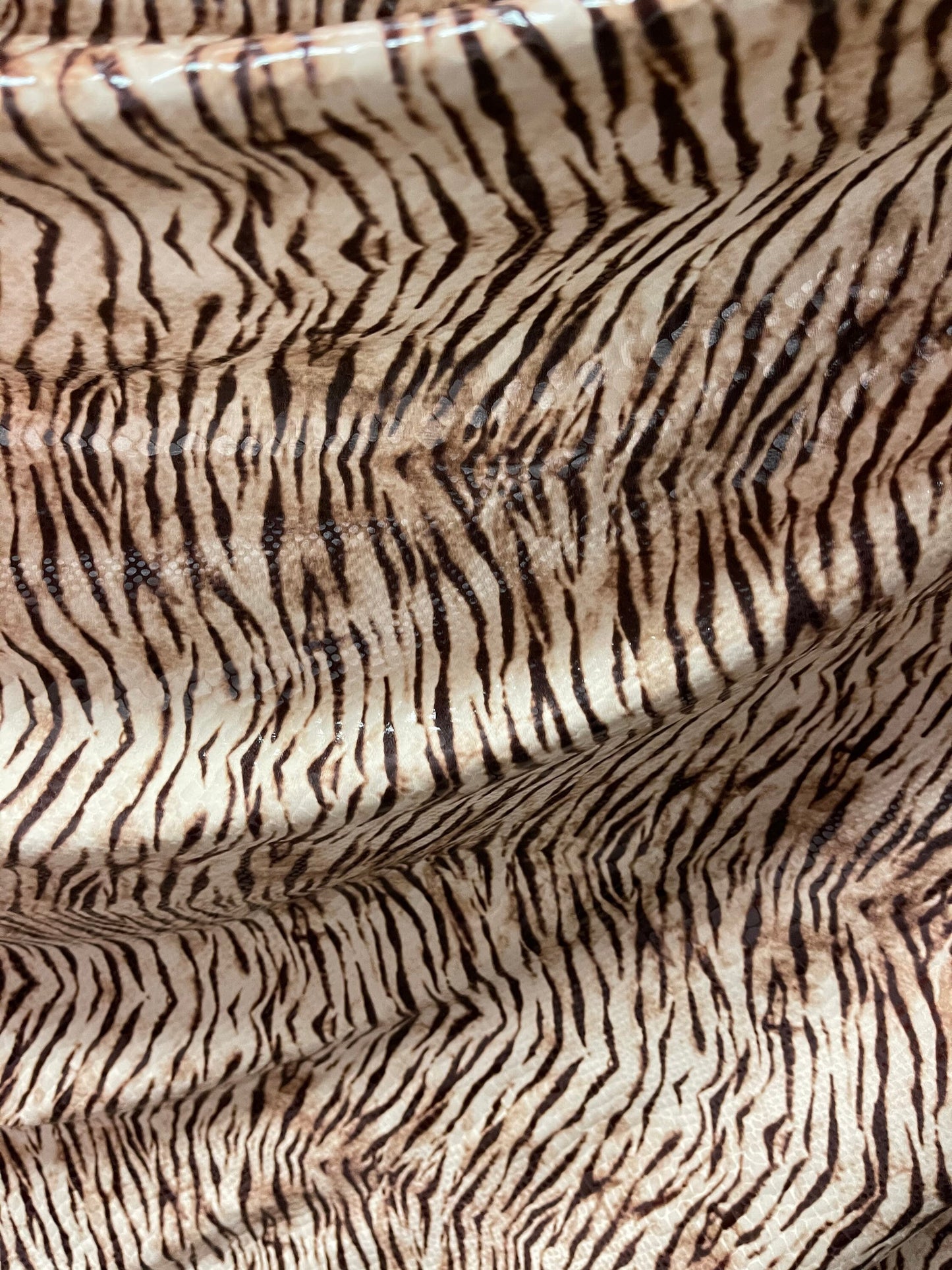 New Exotic Tiger design print on poly spandex 2-way stretch with clear foil 58/60” Sold by the YD. Ships Worldwide from Los Angeles CA