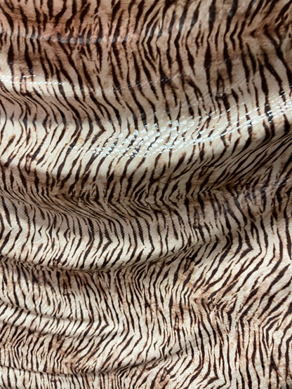 New Exotic Tiger design print on poly spandex 2-way stretch with clear foil 58/60” Sold by the YD. Ships Worldwide from Los Angeles CA