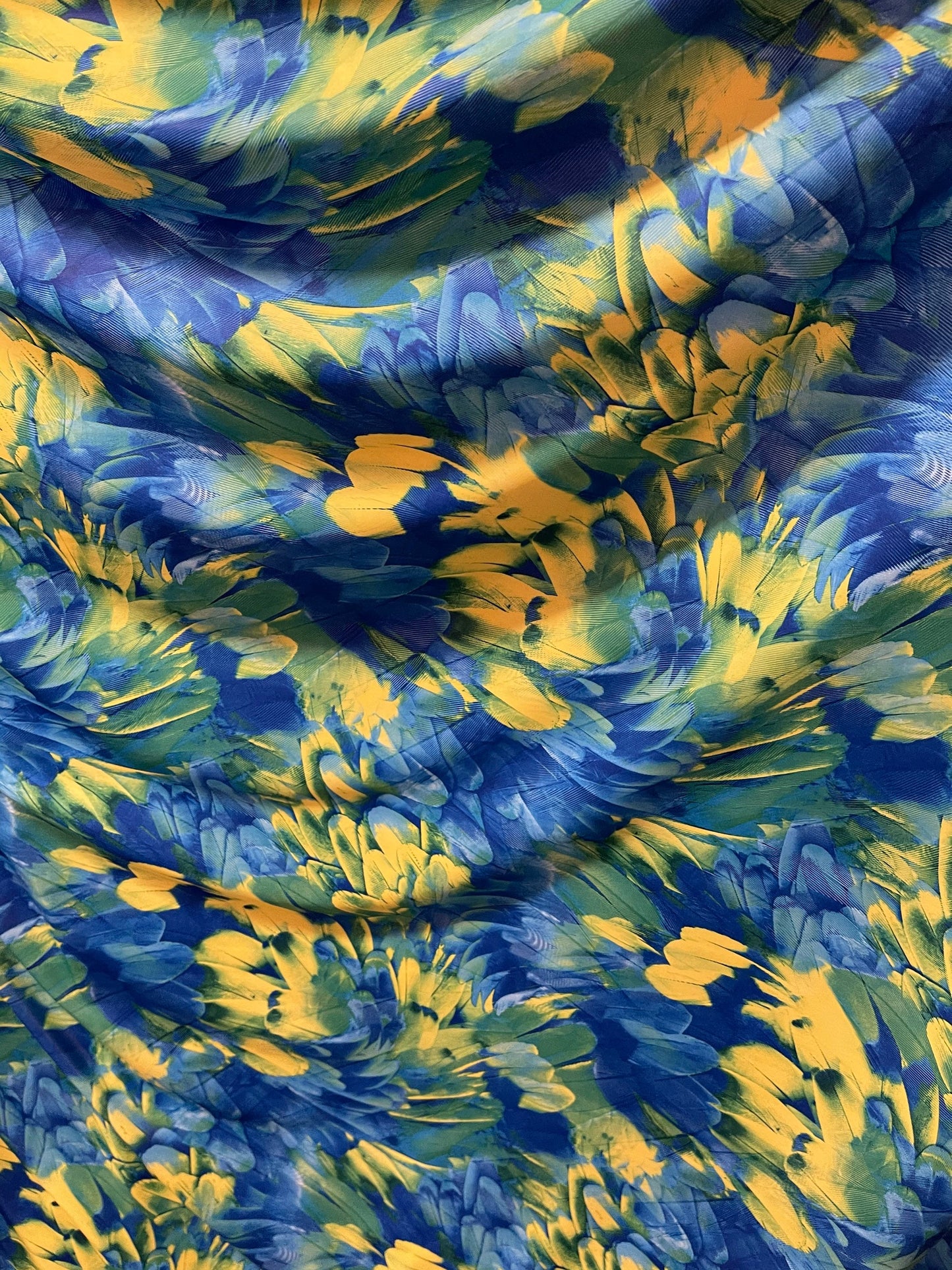 Exotic feathers design blue/green print on best quality of nylon spandex 4-way stretch 58/60” Sold by the YD. Ships Worldwide