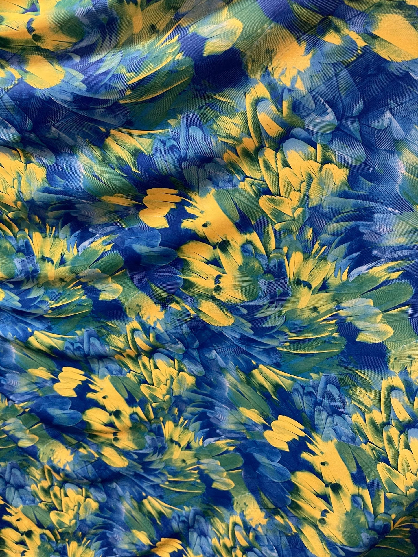 Exotic feathers design blue/green print on best quality of nylon spandex 4-way stretch 58/60” Sold by the YD. Ships Worldwide