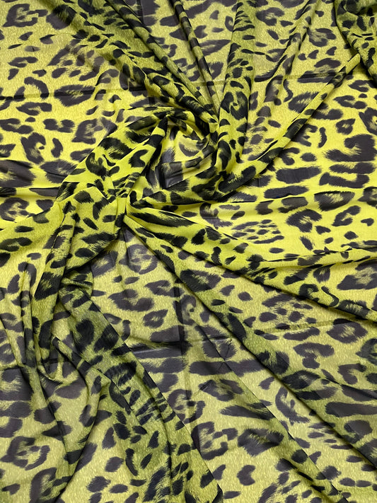 Exotic leopard design neon Yellow/black print on power mesh 4-way stretch 58/60” Sold by the YD. Ships Worldwide from Los Angeles California