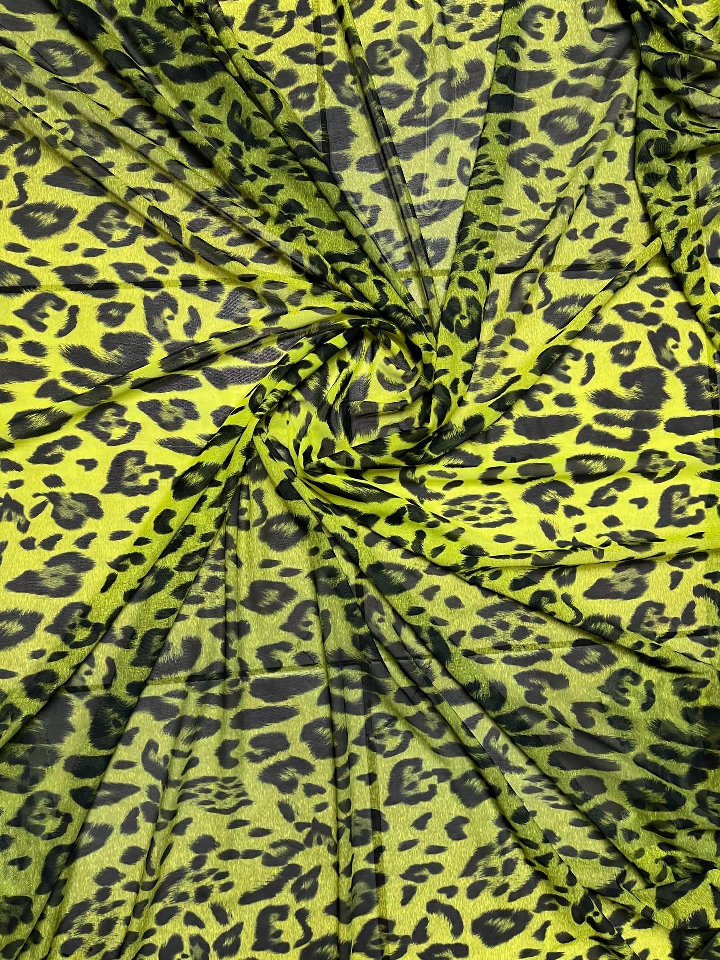 Exotic leopard design neon Yellow/black print on power mesh 4-way stretch 58/60” Sold by the YD. Ships Worldwide from Los Angeles California