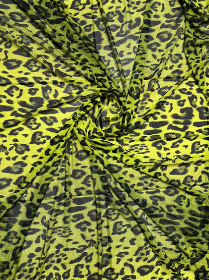 Exotic leopard design neon Yellow/black print on power mesh 4-way stretch 58/60” Sold by the YD. Ships Worldwide from Los Angeles California