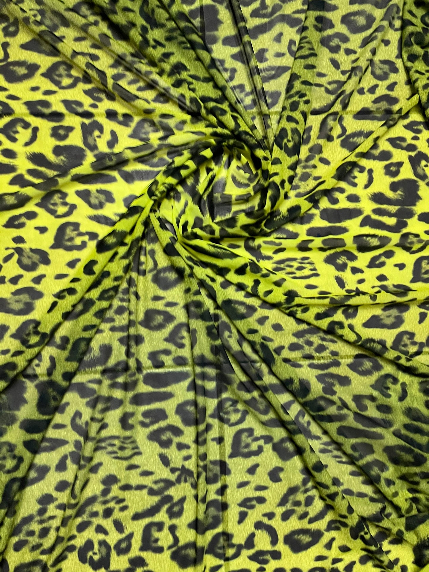 Exotic leopard design neon Yellow/black print on power mesh 4-way stretch 58/60” Sold by the YD. Ships Worldwide from Los Angeles California