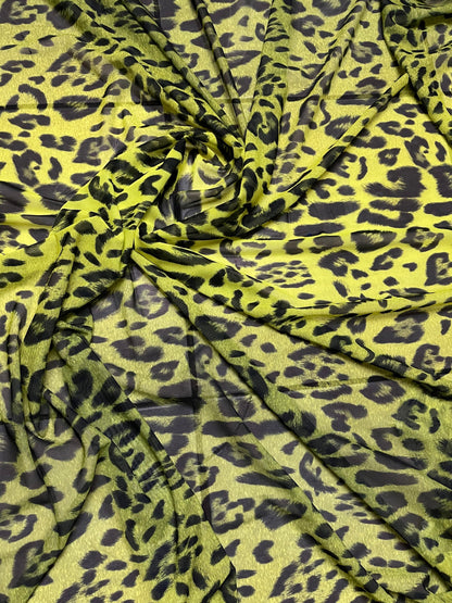 Exotic leopard design neon Yellow/black print on power mesh 4-way stretch 58/60” Sold by the YD. Ships Worldwide from Los Angeles California