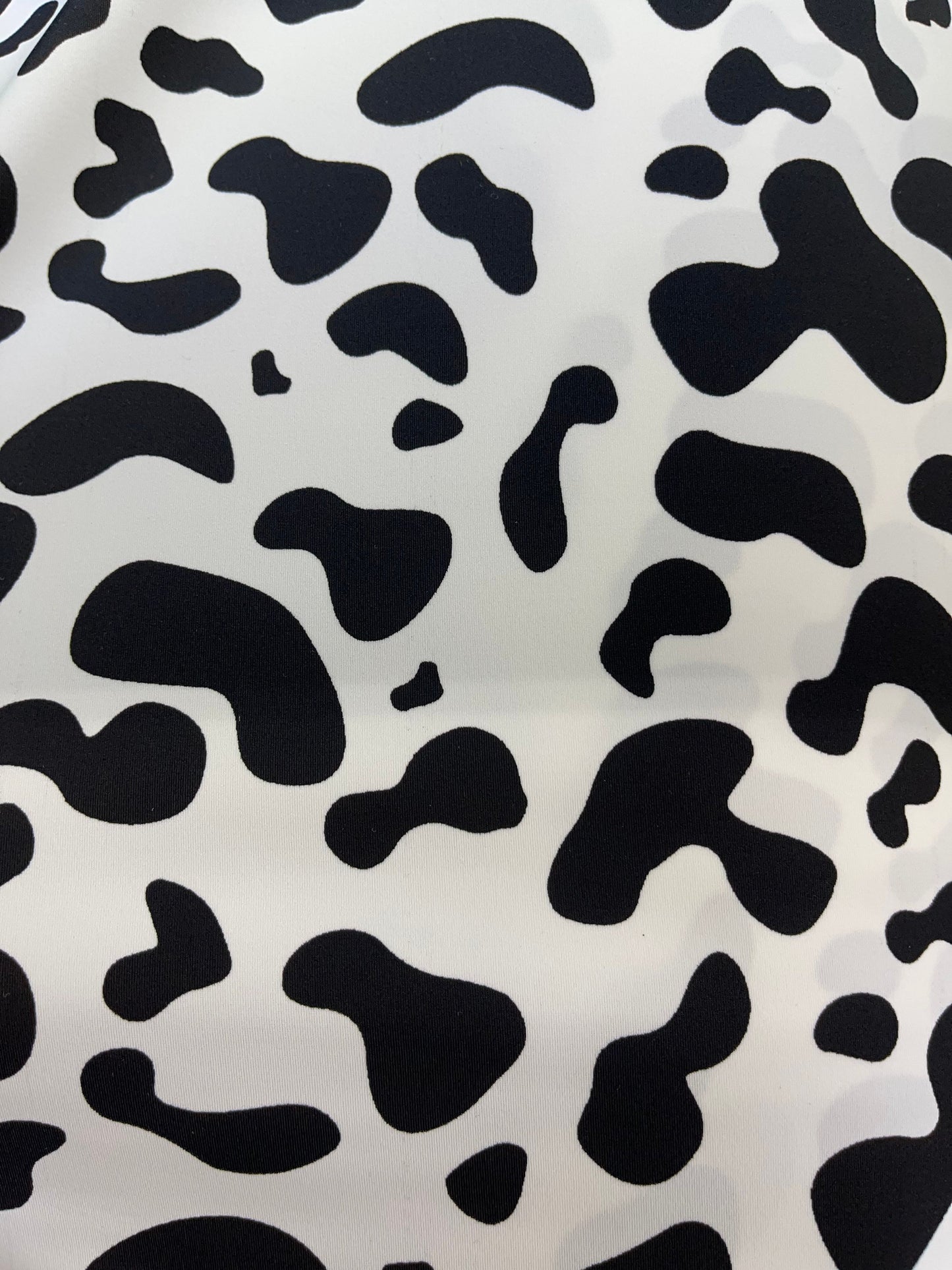 New Exotic cow design White/black print on best quality of nylon spandex 4-way stretch 58/60” Sold by the YD. Ships Worldwide from Los Angel