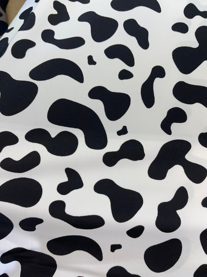 New Exotic cow design White/black print on best quality of nylon spandex 4-way stretch 58/60” Sold by the YD. Ships Worldwide from Los Angel