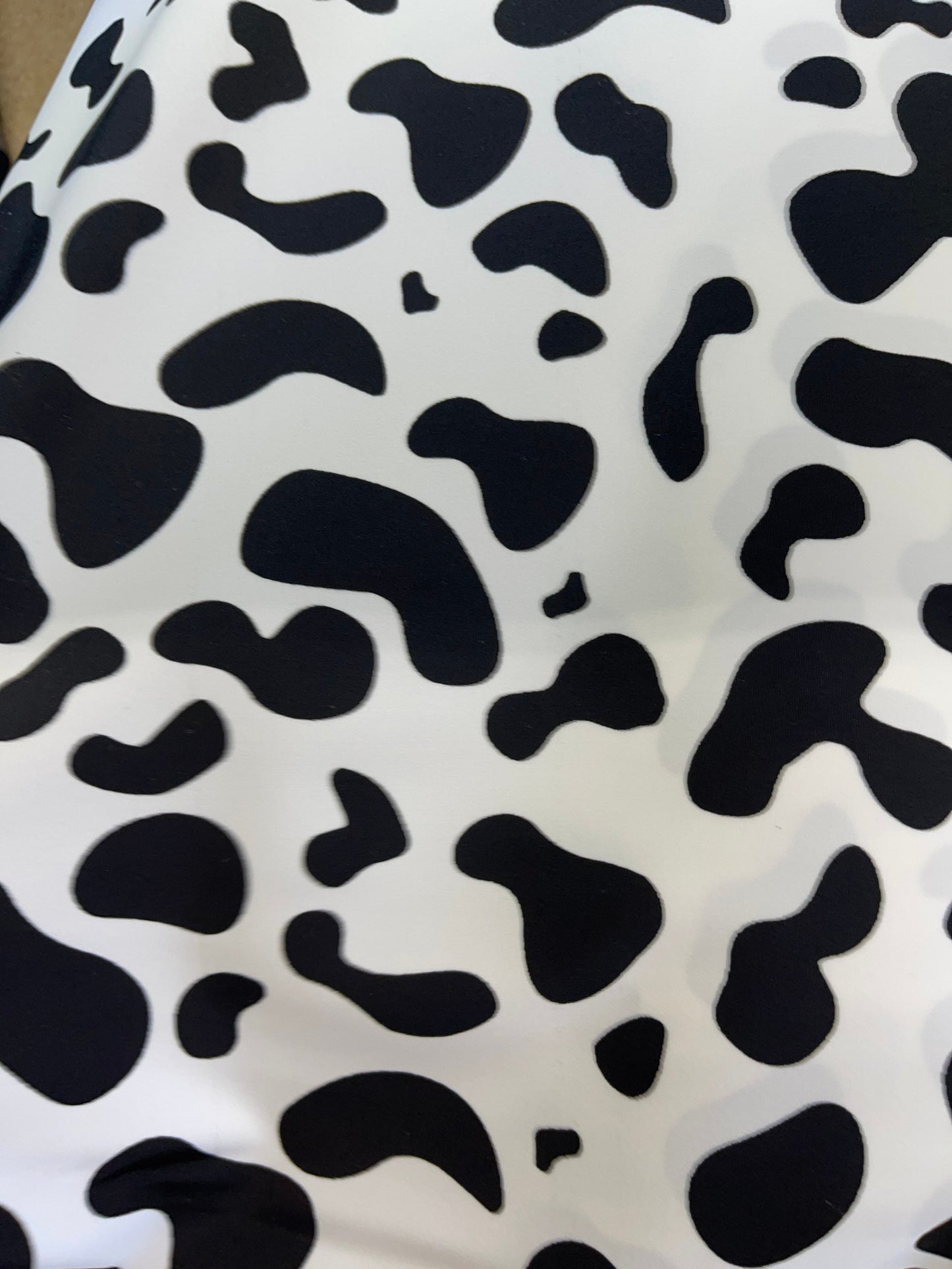 New Exotic cow design White/black print on best quality of nylon spandex 4-way stretch 58/60” Sold by the YD. Ships Worldwide from Los Angel