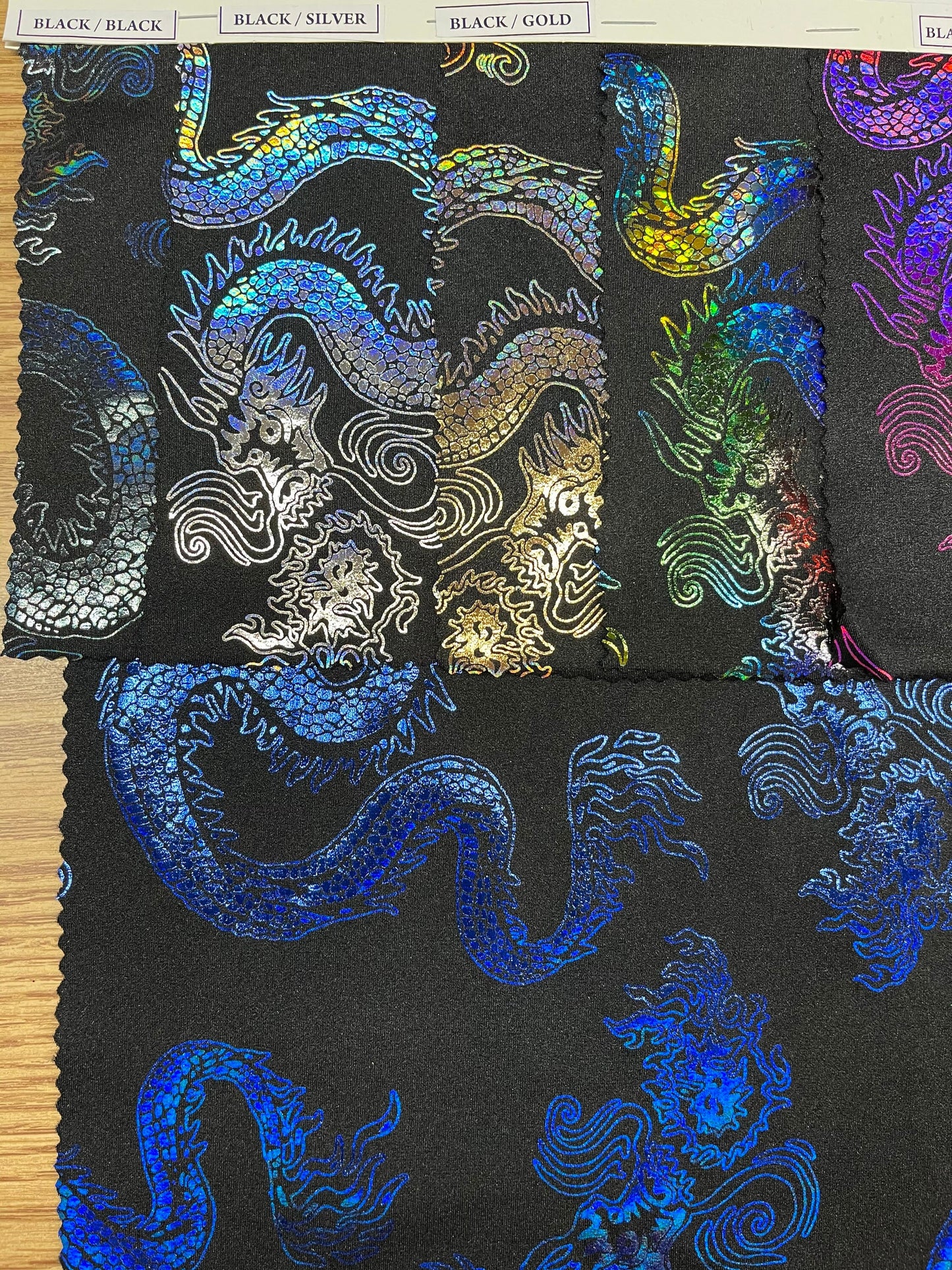 Exotic Dancing Dragón design hologram nylon spandex 4-way stretch 58/60” Sold by the YD. Ships Worldwide from Los Angeles California USA.