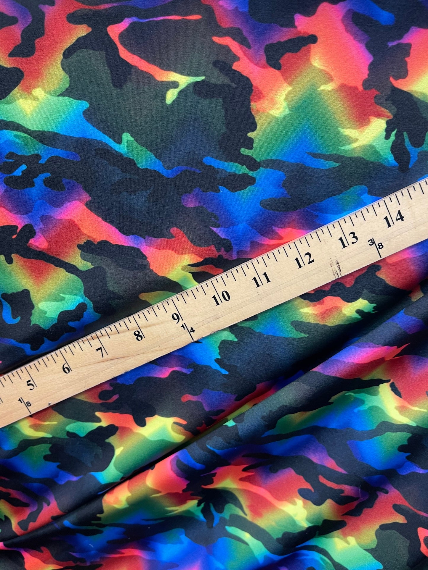 Camouflage design rainbow color print on great quality of Nylon spandex 4-way stretch 58/60” Sold by the YD. Ships Worldwide from L.A