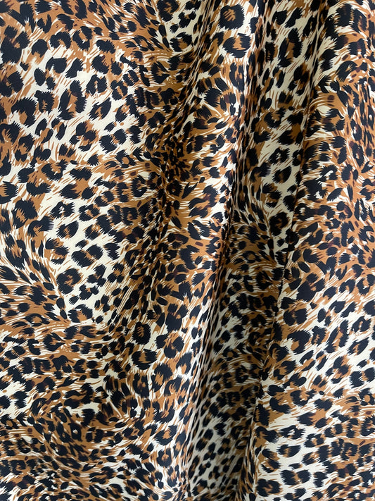 New Exotic Leopard design print on neoprene super techno 2-way stretch 58/60” and on Satin. Sold by the YD. Ships Worldwide from L.A.