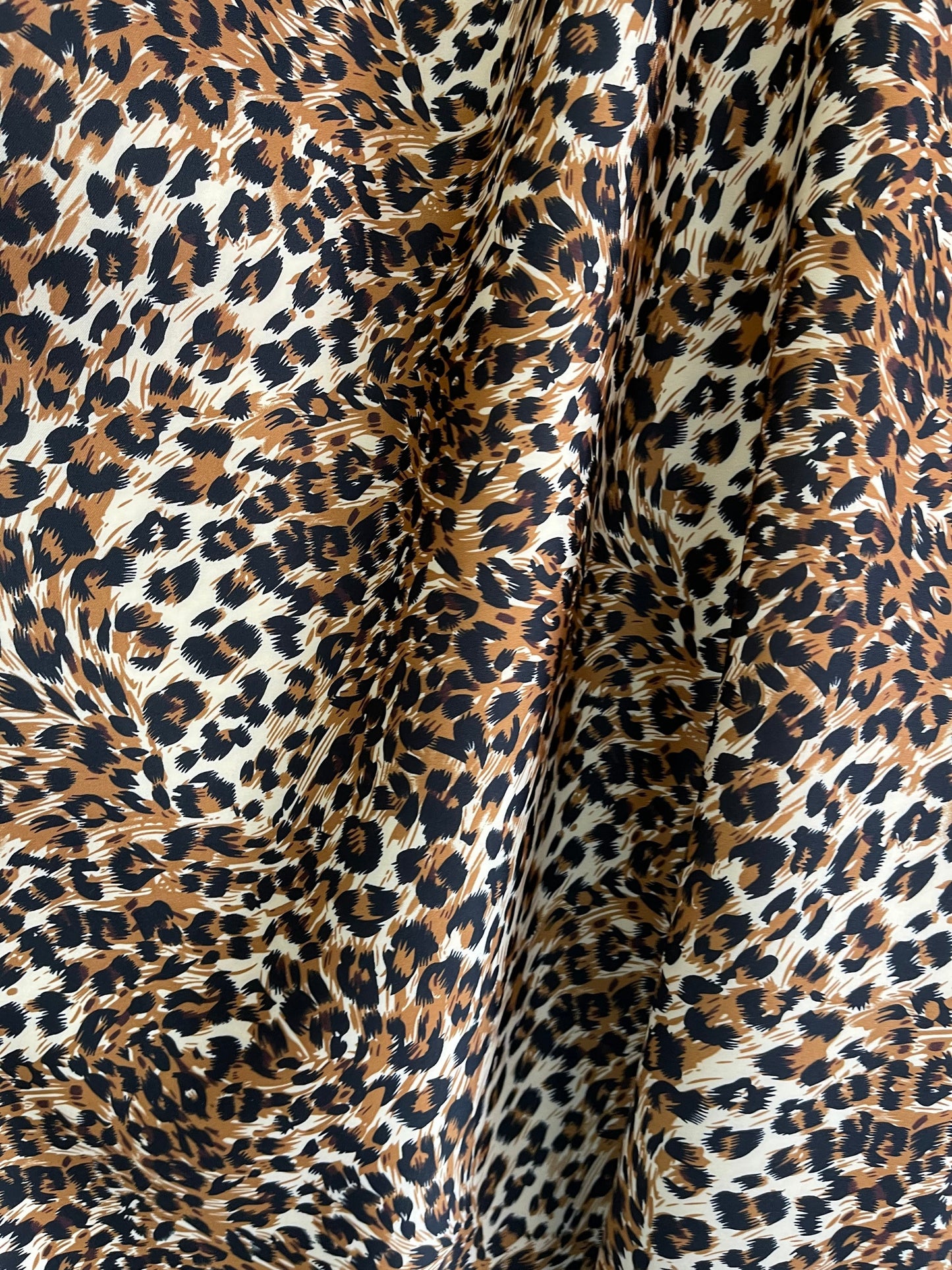 New Exotic Leopard design print on neoprene super techno & Satin 2-way stretch 58/60” and on Satin. Sold by the YD. Ships Worldwide from L.A
