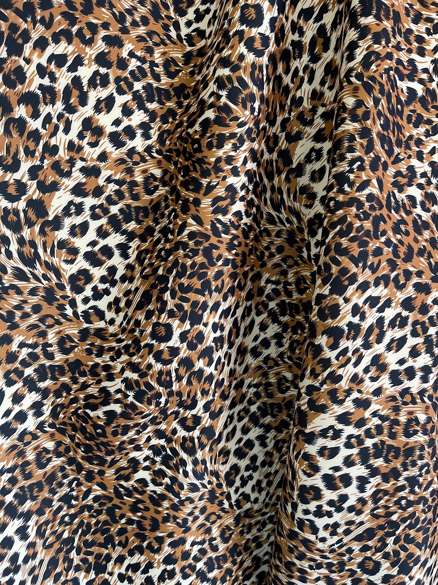 New Exotic Leopard design print on neoprene super techno & Satin 2-way stretch 58/60” and on Satin. Sold by the YD. Ships Worldwide from L.A