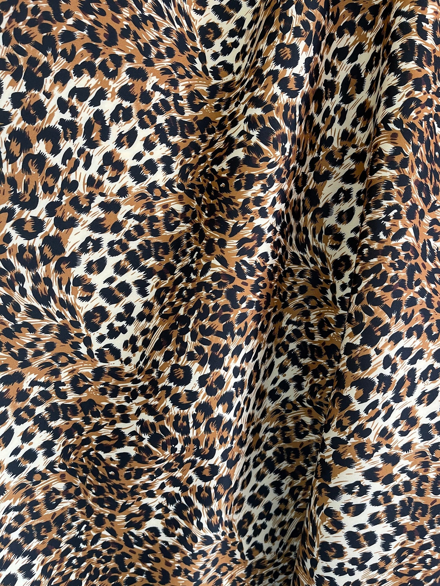 New Exotic Leopard design print on neoprene super techno & Satin 2-way stretch 58/60” and on Satin. Sold by the YD. Ships Worldwide from L.A