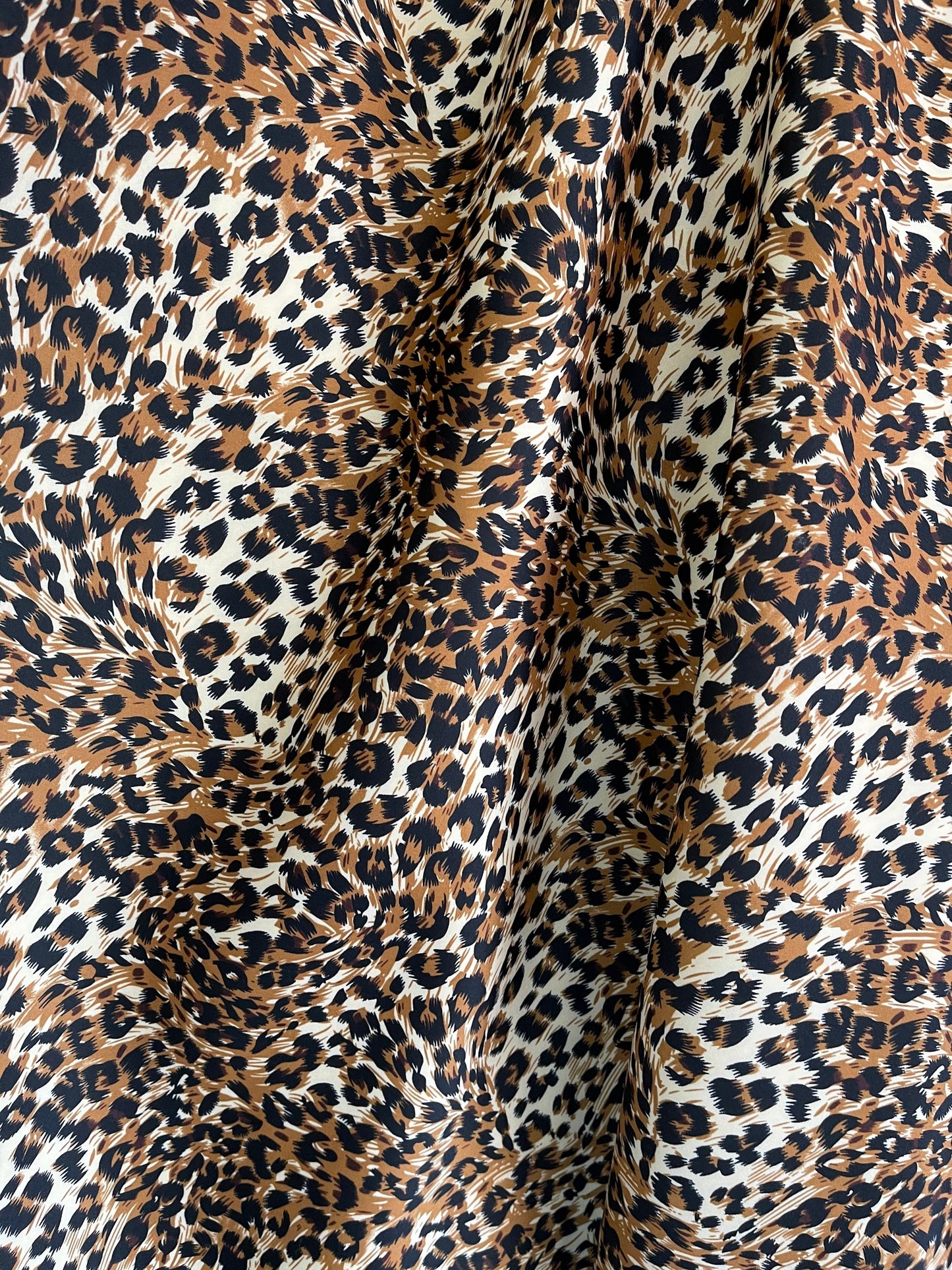 New Exotic Leopard design print on neoprene super techno & Satin 2-way stretch 58/60” and on Satin. Sold by the YD. Ships Worldwide from L.A
