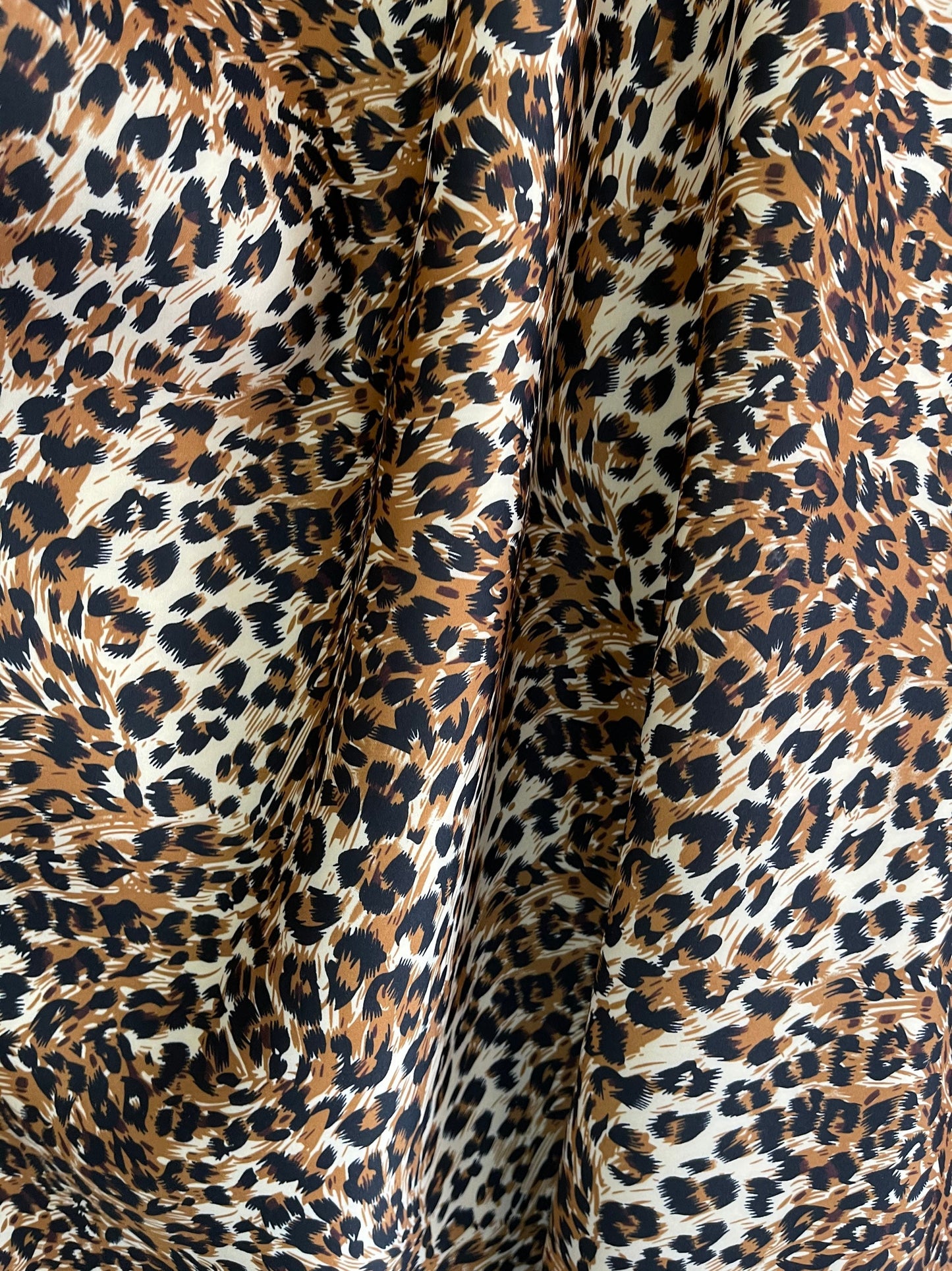 New Exotic Leopard design print on neoprene super techno & Satin 2-way stretch 58/60” and on Satin. Sold by the YD. Ships Worldwide from L.A