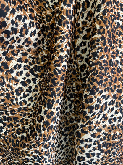 New Exotic Leopard design print on neoprene super techno & Satin 2-way stretch 58/60” and on Satin. Sold by the YD. Ships Worldwide from L.A