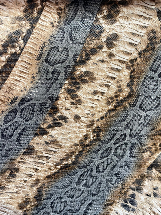 New snake design print on Poly spandex 2-way stretch medium weight 58/60” Sold by the YD. Ships Worldwide from Los Angeles California USA.