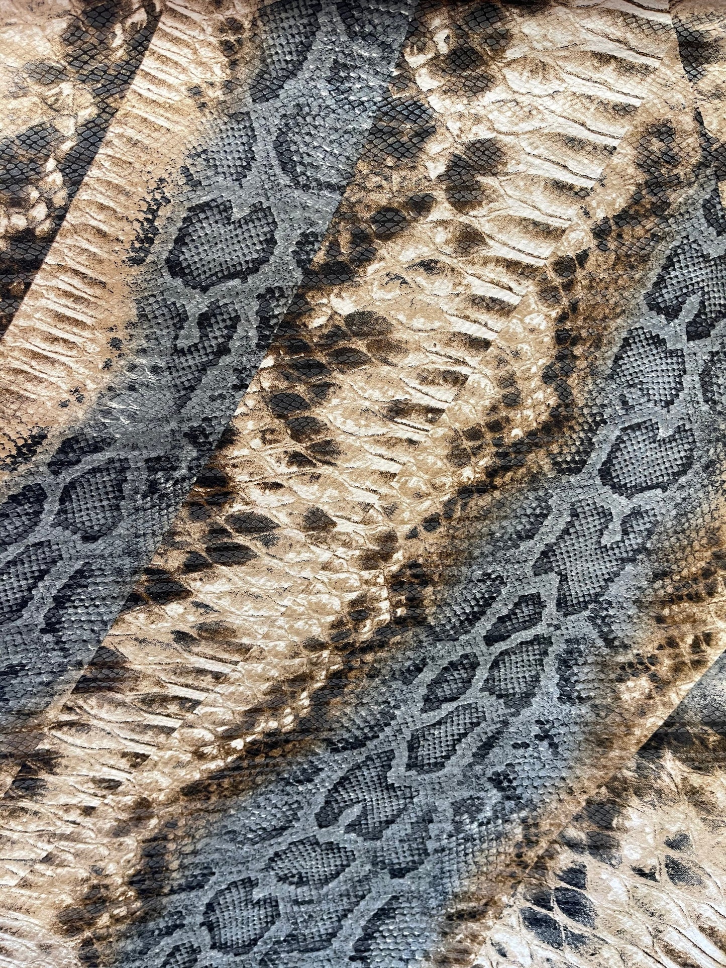 New snake design print on Poly spandex 2-way stretch medium weight 58/60” Sold by the YD. Ships Worldwide from Los Angeles California USA.