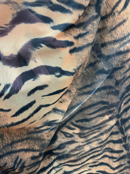 Exotic Tiger design print on great quality of power mesh 4-way stretch 58/60” Sold by the YD. Ships Worldwide from Los Angeles California US