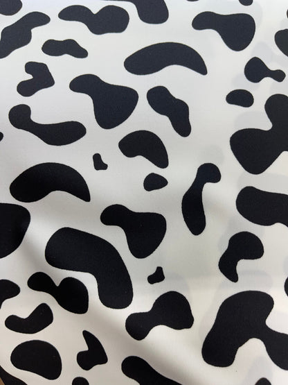 New Exotic cow design White/black print on best quality of nylon spandex 4-way stretch 58/60” Sold by the YD. Ships Worldwide from Los Angel