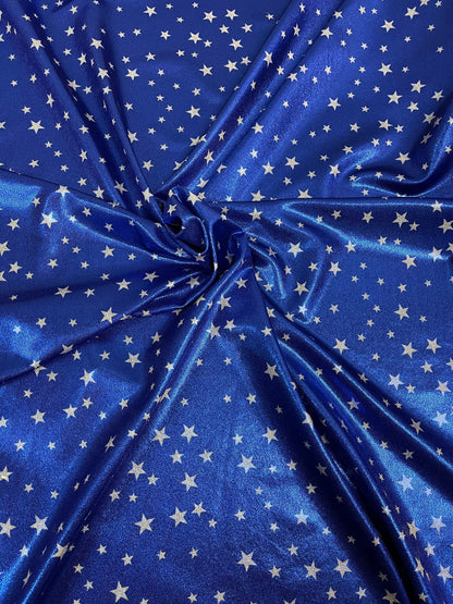 Stars design freedom Blue/White small stars print on metallic nylon spandex 4-way stretch 58/60” Sold by the YD. Ships Worldwide from L.A CA