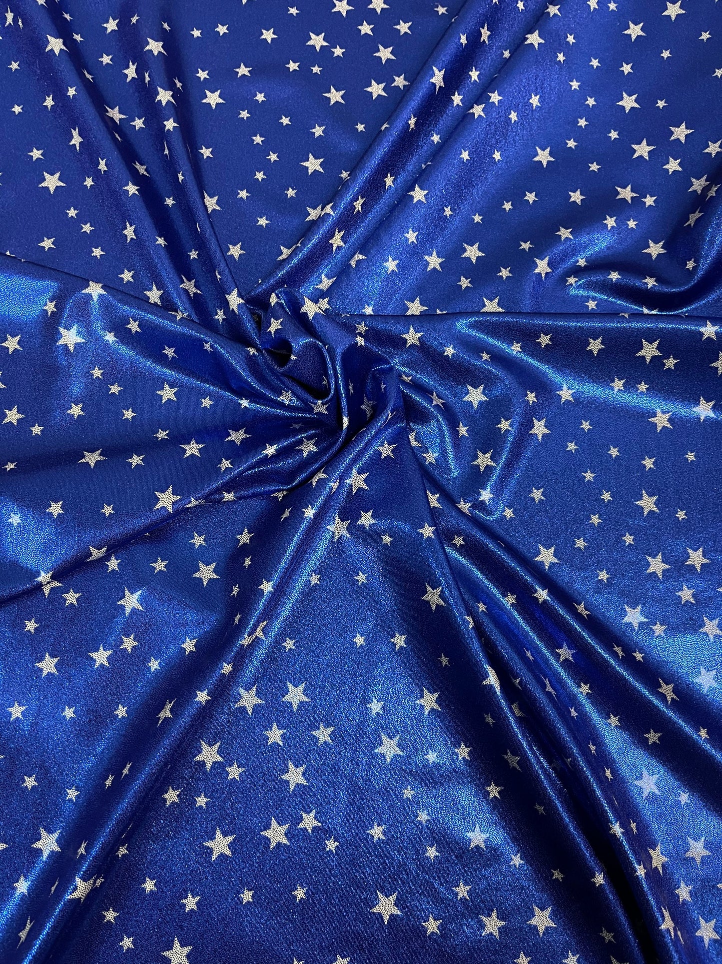 Stars design freedom Blue/White small stars print on metallic nylon spandex 4-way stretch 58/60” Sold by the YD. Ships Worldwide from L.A CA