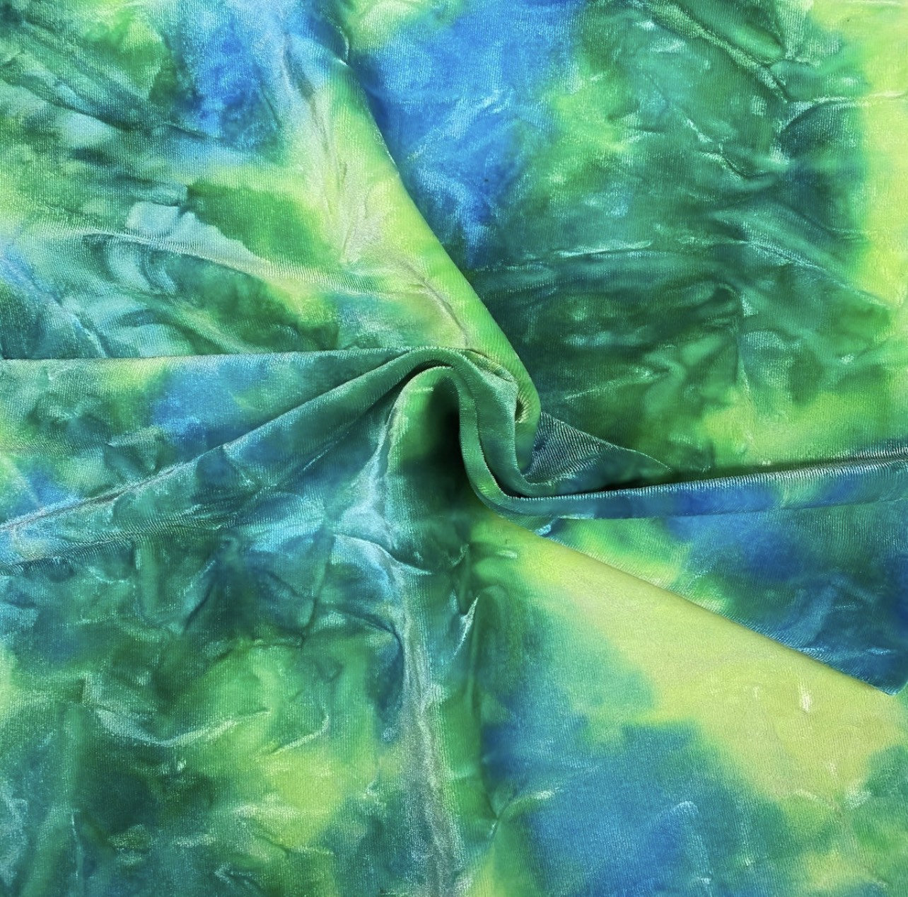 Green blue/yellow Tie Dye Luxury stretch velvet 4-way stretch 58/60” Sold by the YD. Ships Worldwide from Los Angeles California USA.