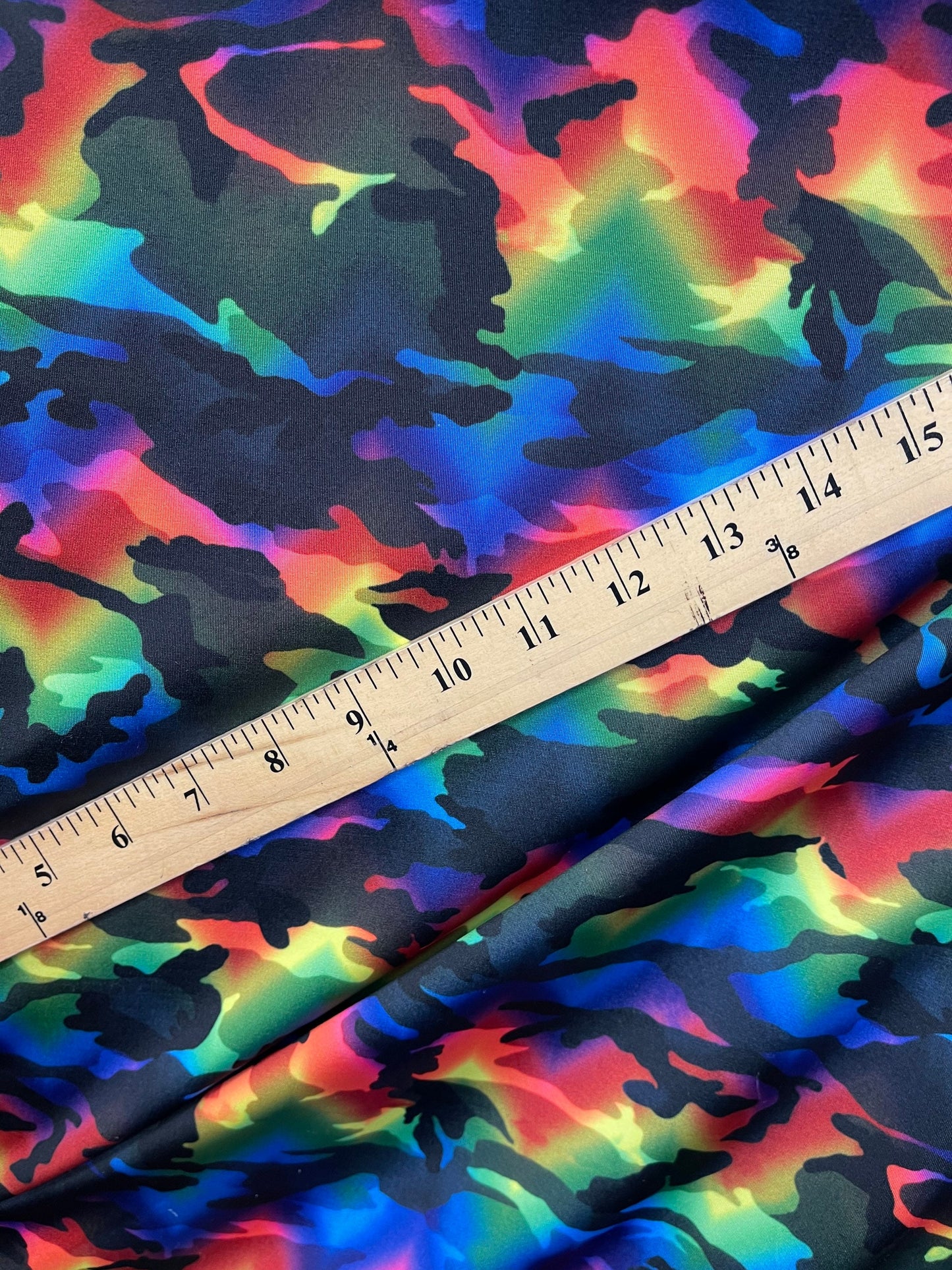 Camouflage design rainbow color print on great quality of Nylon spandex 4-way stretch 58/60” Sold by the YD. Ships Worldwide from L.A