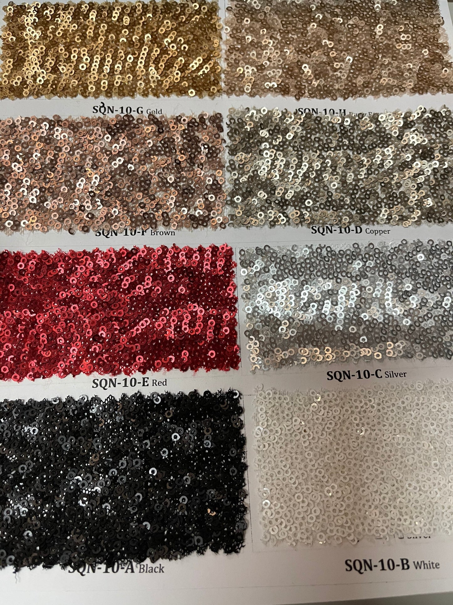 New cosmic mini over lapping dull sequins embroidered on stretch mesh 2-way stretch 54/55” Sold by the YD. Ships Worldwide from Los Angeles