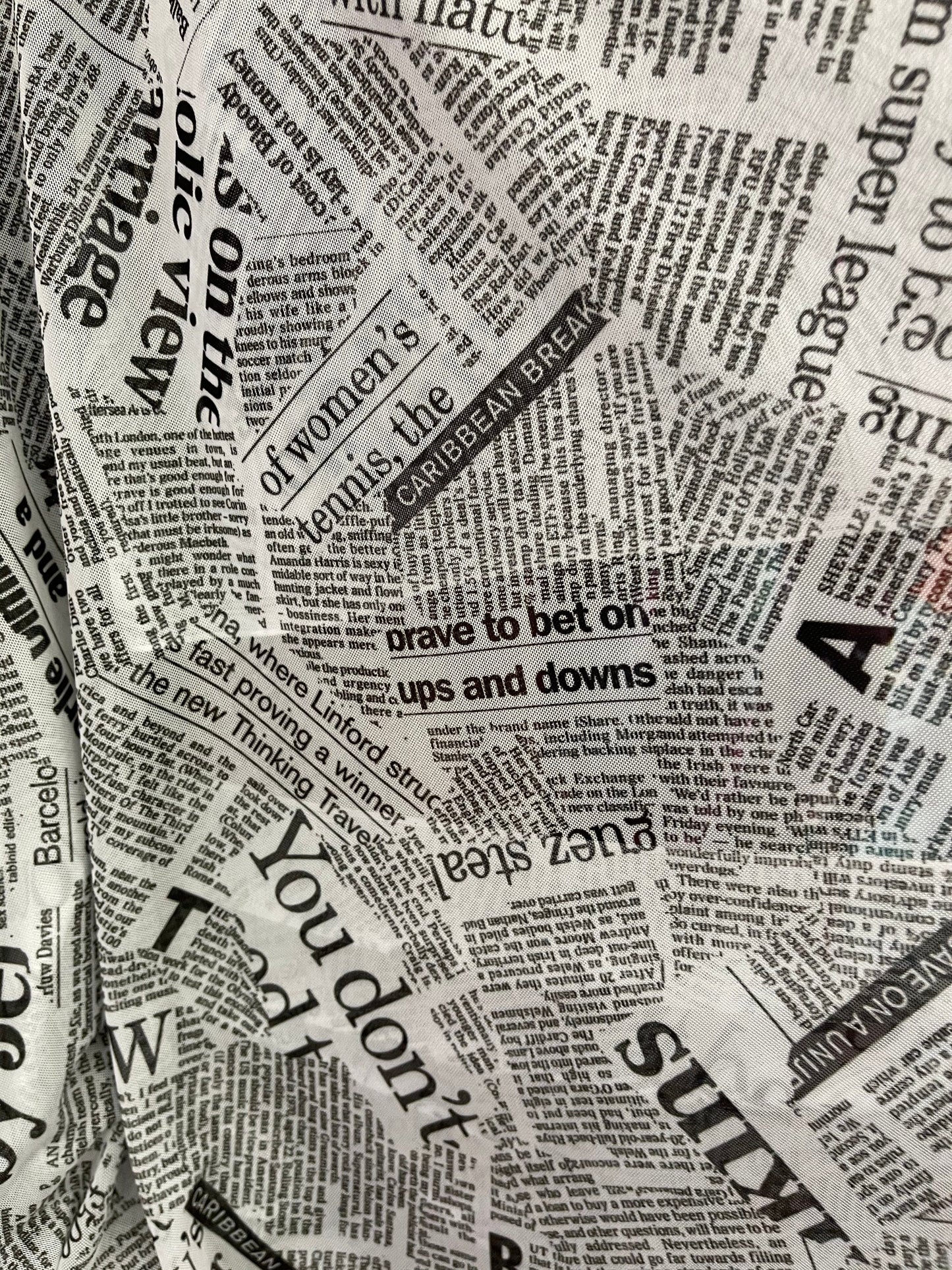 Newspaper design print on great quality of power mesh 4-way stretch 58/60” Sold by the YD. Ships Worldwide from Los Angeles California USA.