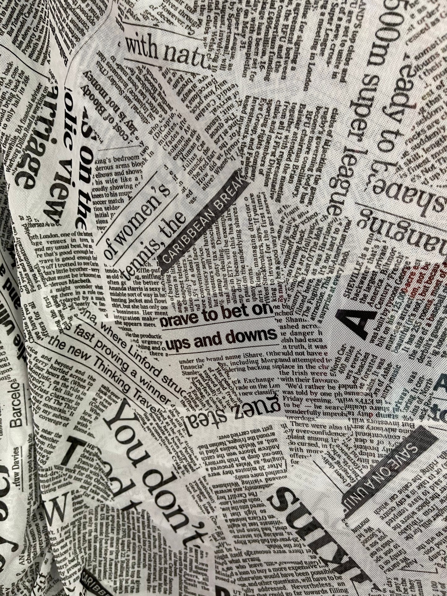 Newspaper design print on great quality of power mesh 4-way stretch 58/60” Sold by the YD. Ships Worldwide from Los Angeles California USA.