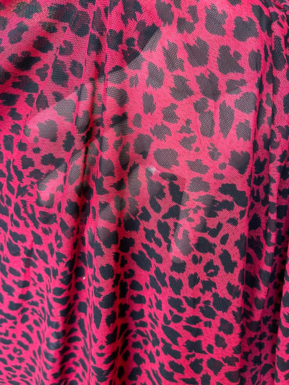 New power mesh animal printCheetah design red/black 4-way stretch 58/60” Sold by the YD. Ships worldwide from Los Angeles California USA.