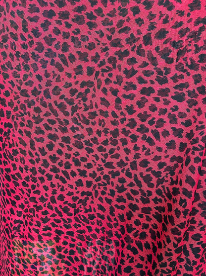 New power mesh animal printCheetah design red/black 4-way stretch 58/60” Sold by the YD. Ships worldwide from Los Angeles California USA.