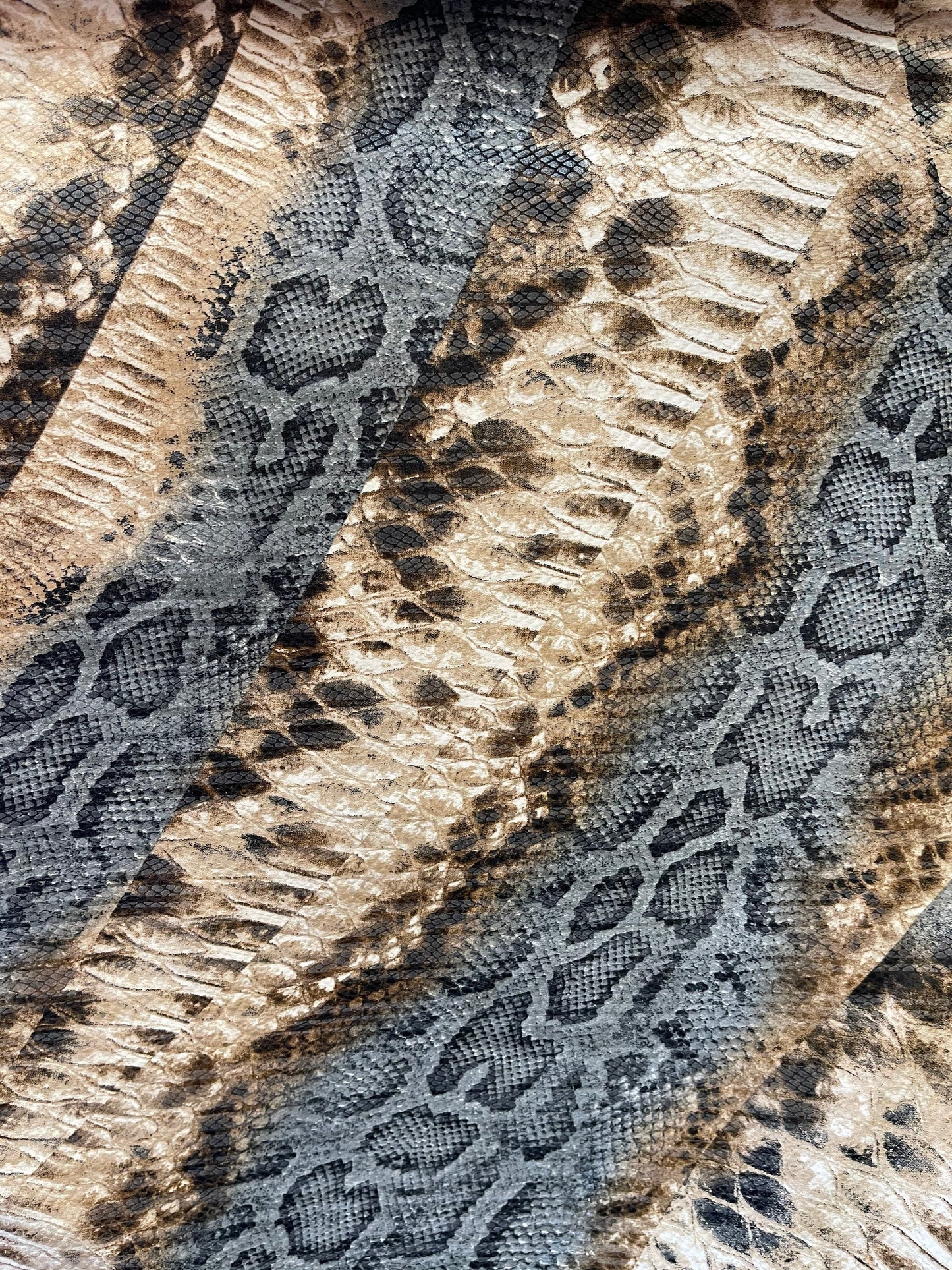 New snake design print on Poly spandex 2-way stretch medium weight 58/60” Sold by the YD. Ships Worldwide from Los Angeles California USA.