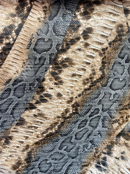 New snake design print on Poly spandex 2-way stretch medium weight 58/60” Sold by the YD. Ships Worldwide from Los Angeles California USA.