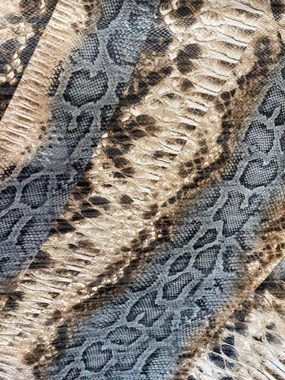 New snake design print on Poly spandex 2-way stretch medium weight 58/60” Sold by the YD. Ships Worldwide from Los Angeles California USA.