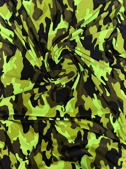 Camouflage design neon colors print on poly spandex 4-way stretch 58/60” Sold by the YD. Ships Worldwide from Los Ángeles California USA.