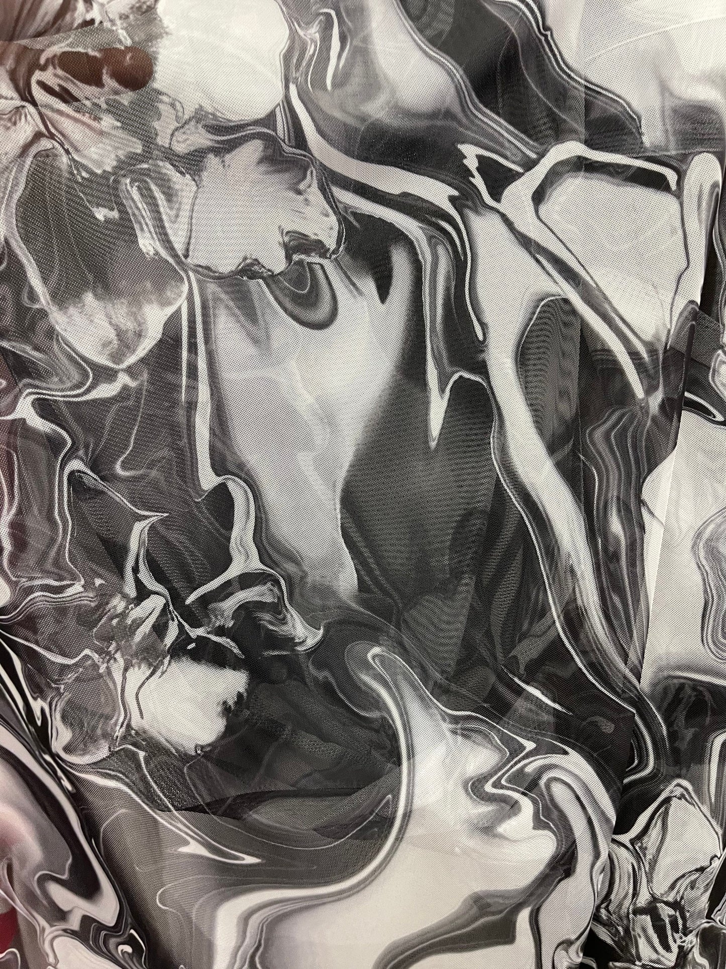 New Modern abstract lava design Black/White print on best quality of power mesh spandex 4-way stretch 58/60” Sold by the YD. Ships Worldwide