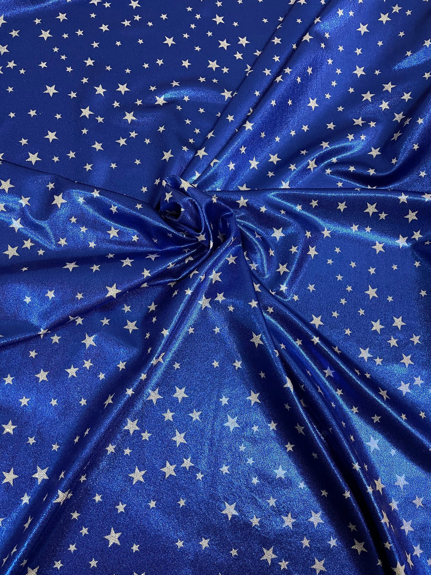 Stars design freedom Blue/White small stars print on metallic nylon spandex 4-way stretch 58/60” Sold by the YD. Ships Worldwide from L.A CA