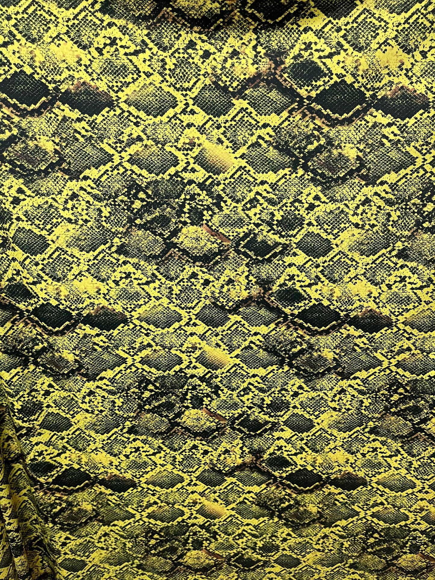 Python Snake design exotic animal print on best quality of nylon spandex 4-way stretch 58/60” Sold by the YD. Ships Worldwide from L.A CA