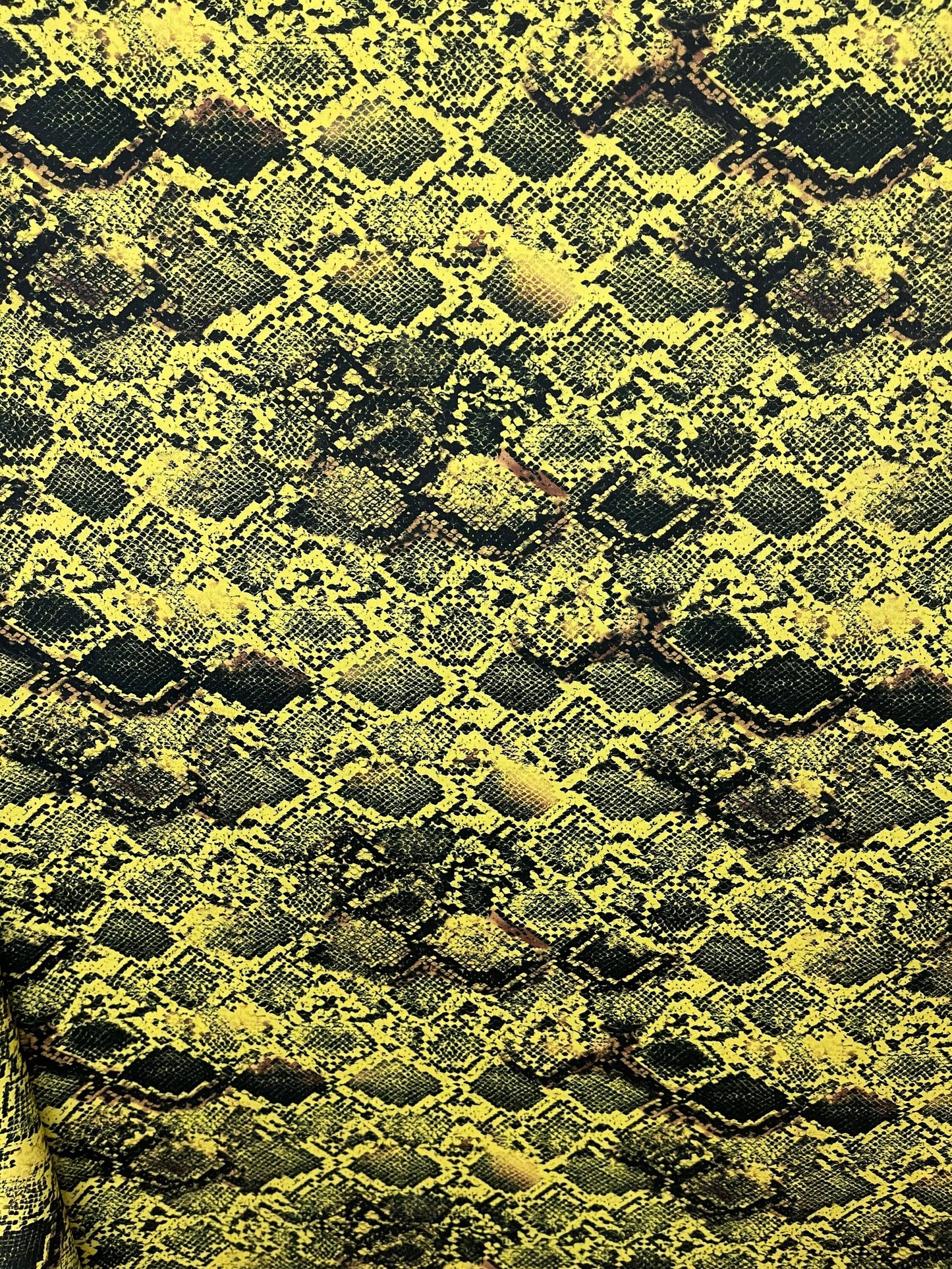 Python Snake design exotic animal print on best quality of nylon spandex 4-way stretch 58/60” Sold by the YD. Ships Worldwide from L.A CA
