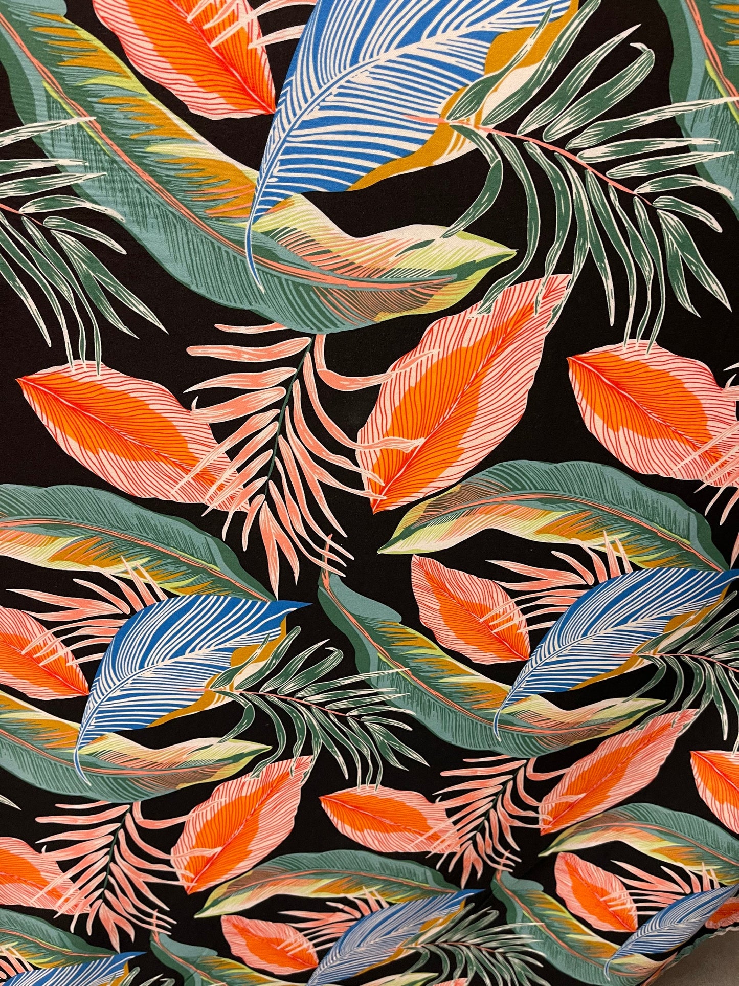 New tropical leaf design print on spandex poly techno 2-way stretch 58/60” Sold by the YD. Ships Worldwide from Los Angeles California USA.