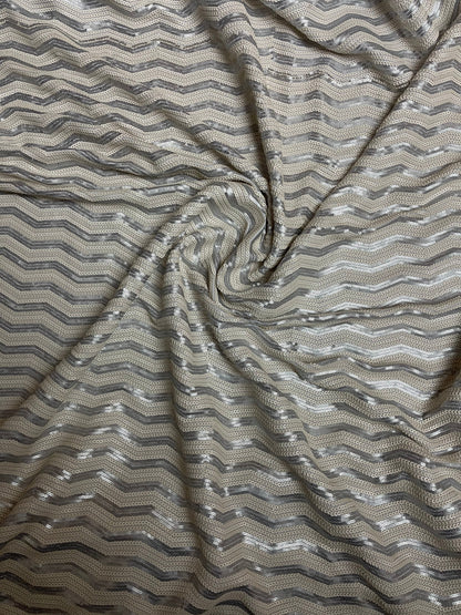 Luxury Chevron design embroidered on spandex base 2-way stretch silver/pearl white sequins 58/60” Sold by the YD. Ships Worldwide from L.A