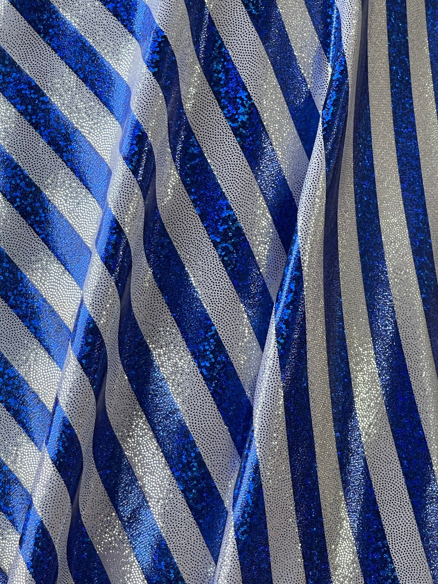Stripes design Freedom American stripes metallic nylon spandex with foggy foil 4-way stretch 58/60” Sold by the YD. Ships Worldwide