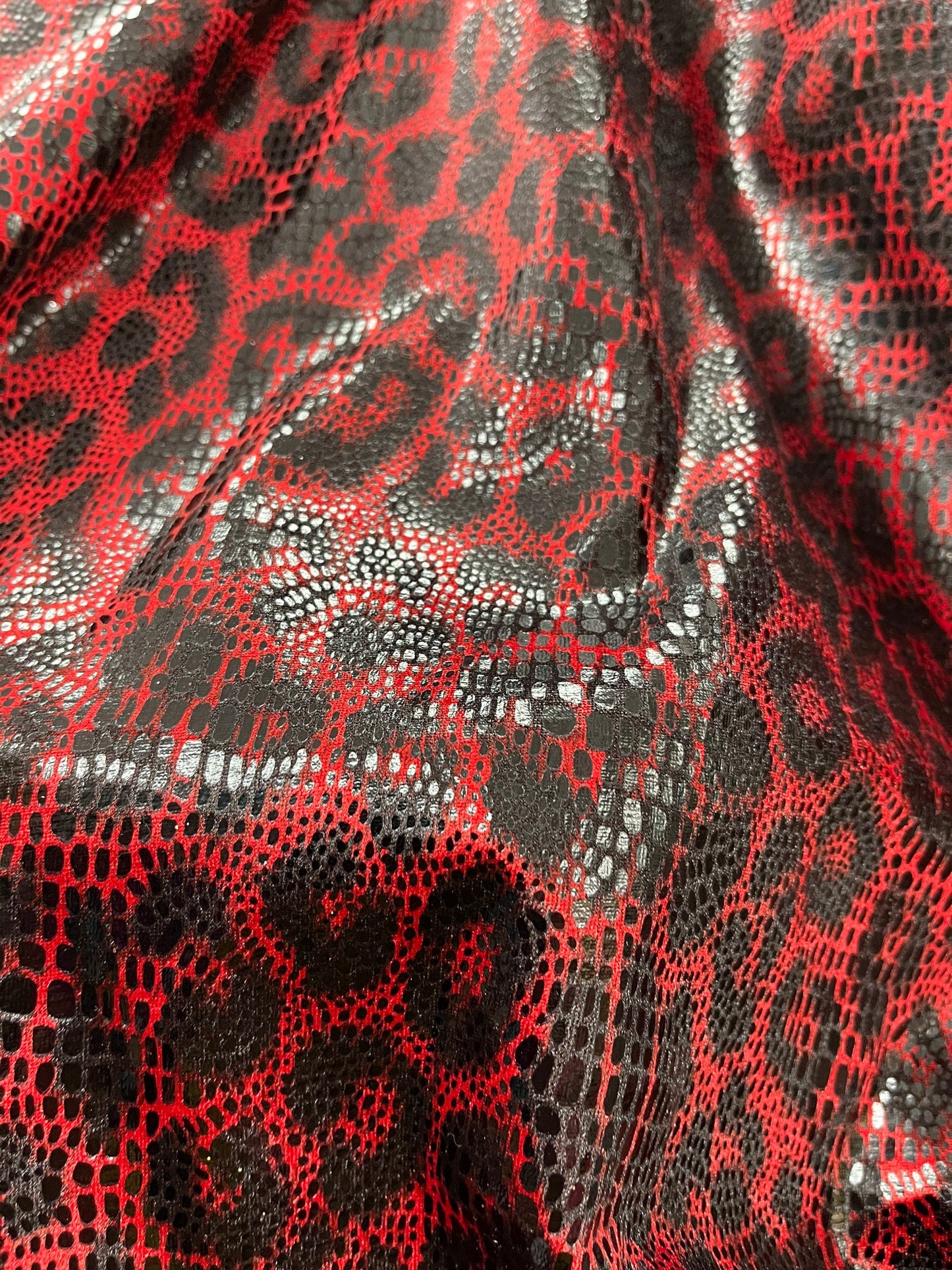 Exotic Leopard design print On Interlock with foil non stretch 58/60” Sold by the YD. Ships Worldwide from Los Angeles California USA