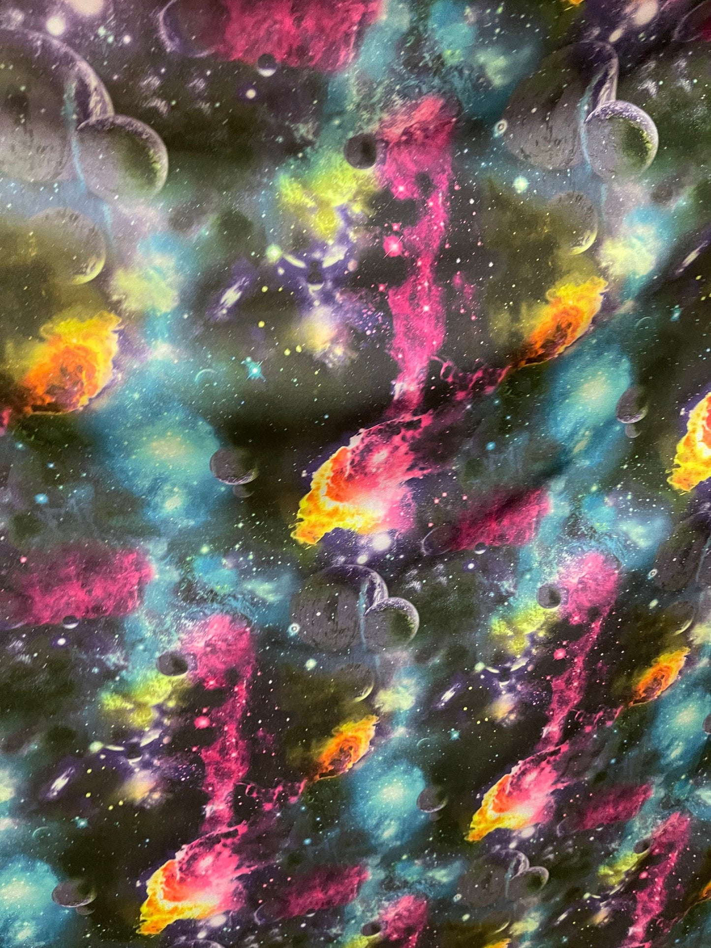 Galaxy design black/multicolor print on poly spandex 4-way stretch 58/60” Sold by the YD. Ships Worldwide from Los Ángeles California USA.