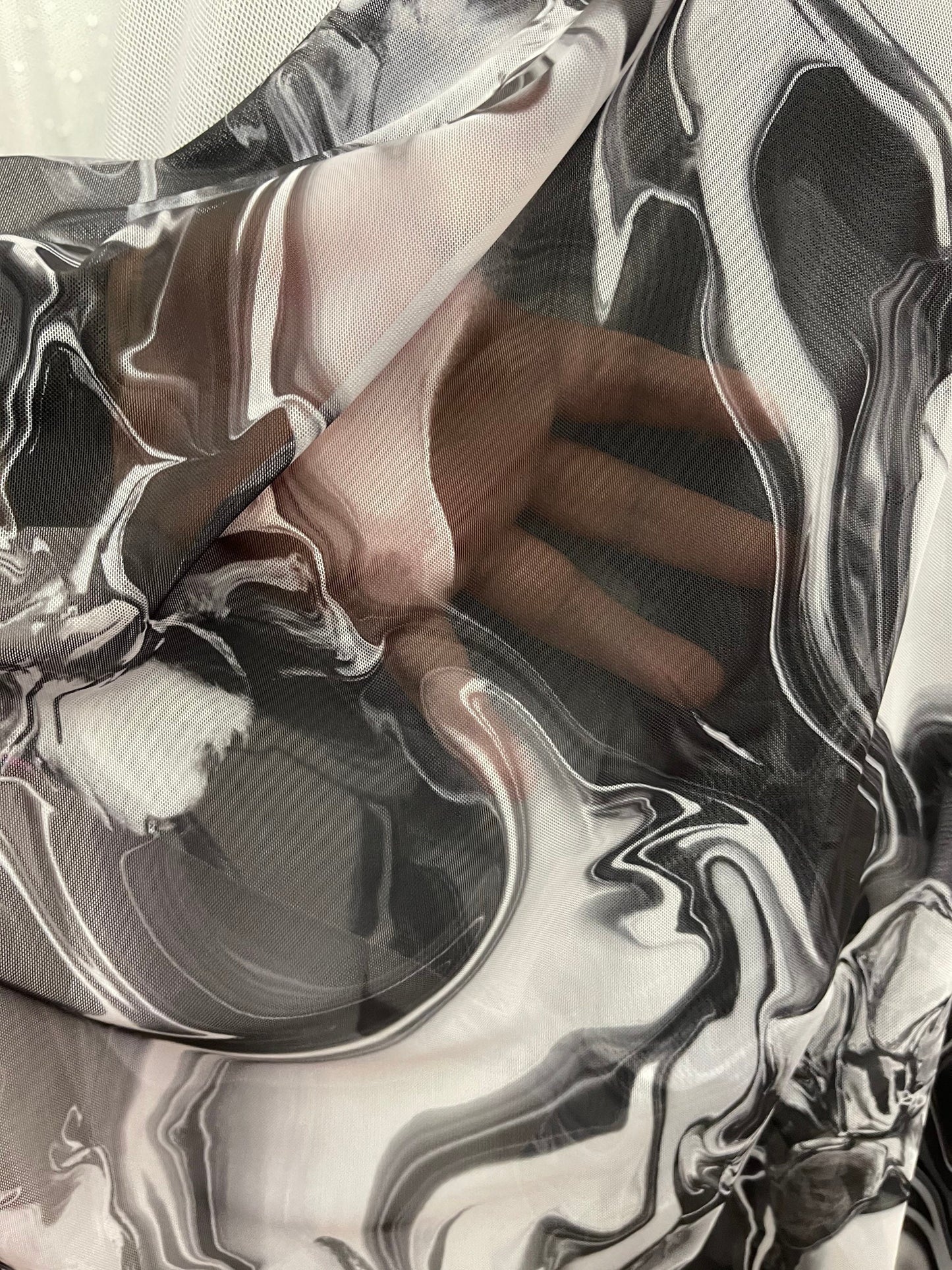New Modern abstract lava design Black/White print on best quality of power mesh spandex 4-way stretch 58/60” Sold by the YD. Ships Worldwide