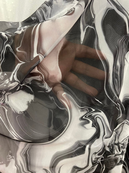 New Modern abstract lava design Black/White print on best quality of power mesh spandex 4-way stretch 58/60” Sold by the YD. Ships Worldwide