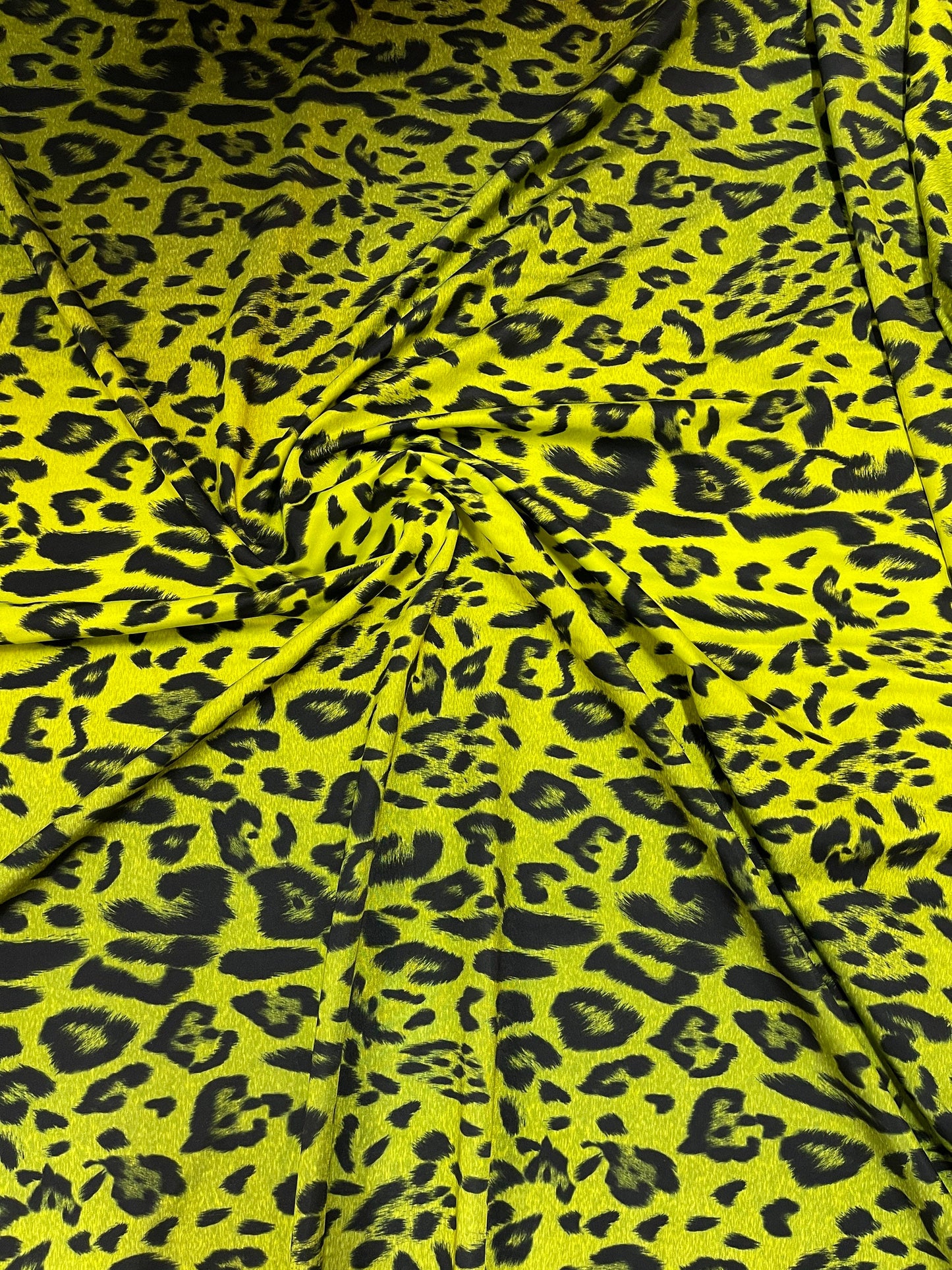 Exotic Leopard design print on ombre neon ye spandex 4-way stretch 58/60” Sold by the YD. Ships Worldwide from Los Angeles California USA.